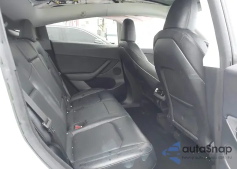 2023 Tesla Model Y из США, поврежденный, VIN 7SAYGDEF8PF800742